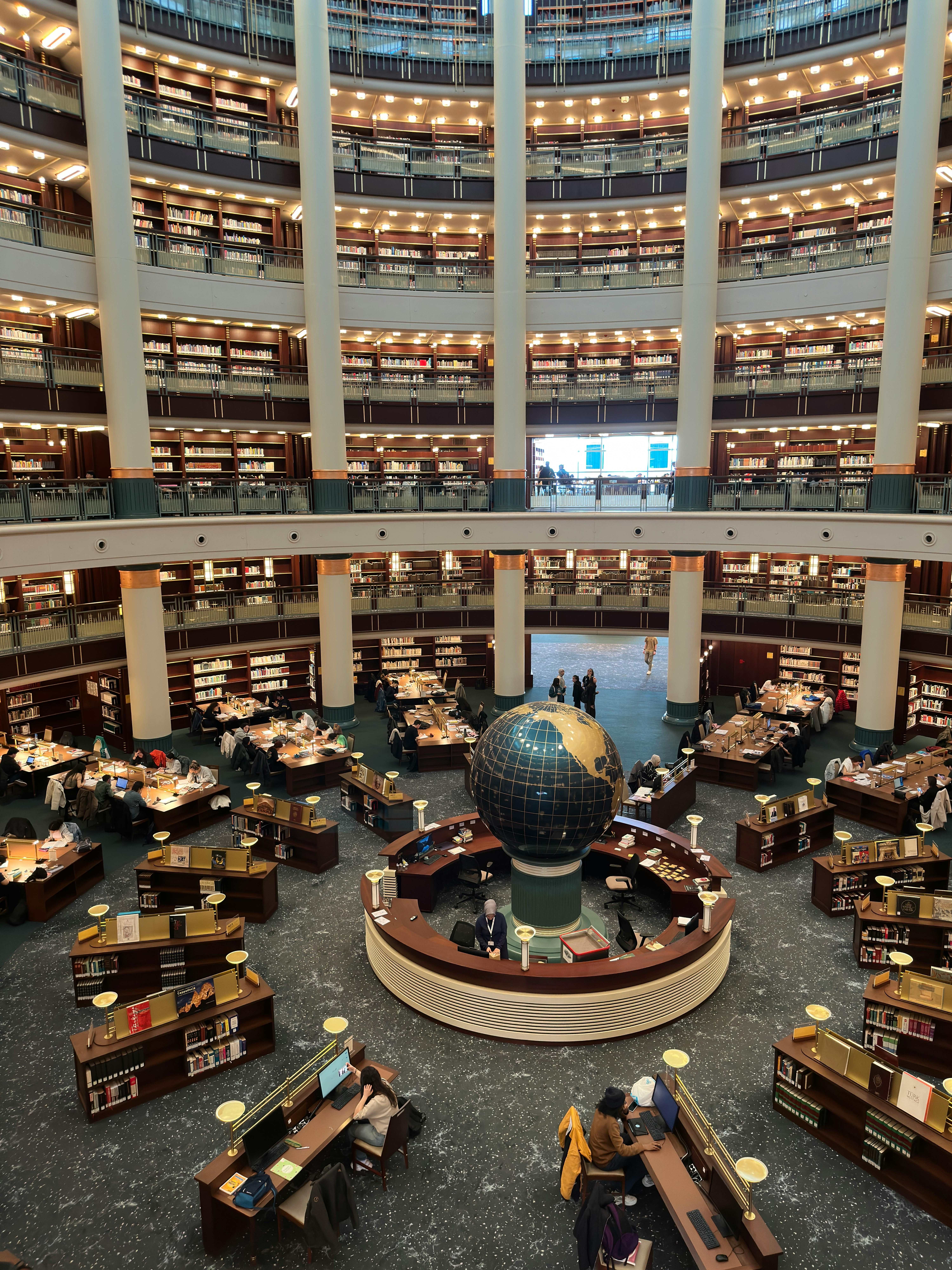 Modern university library in Turkey with students studying